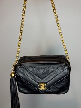 CHANEL Black Quilted Leather Crossbody Bag with Gold Chain & Tassel